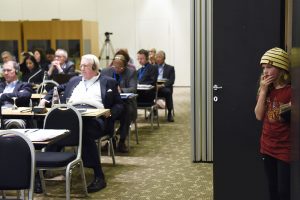 The future peers through the door into the ICMC Council Plenary Meeting.