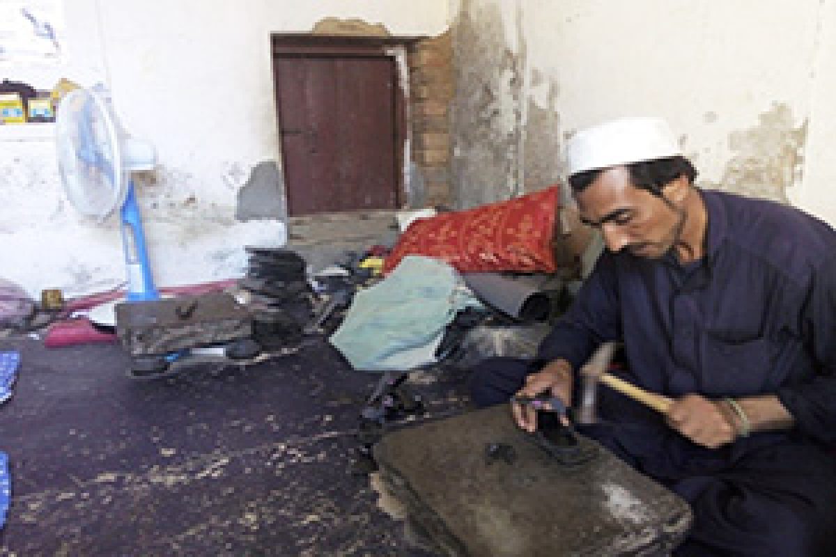 Masour Set up His Shoe-Making Business After Attending ICMC's Training in Pakistan