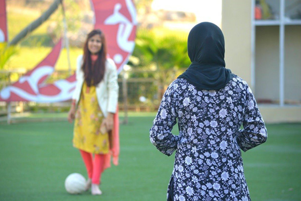 Alaf plays with the ICMC Child Protection Officer at the Safe Home in Islamabad.