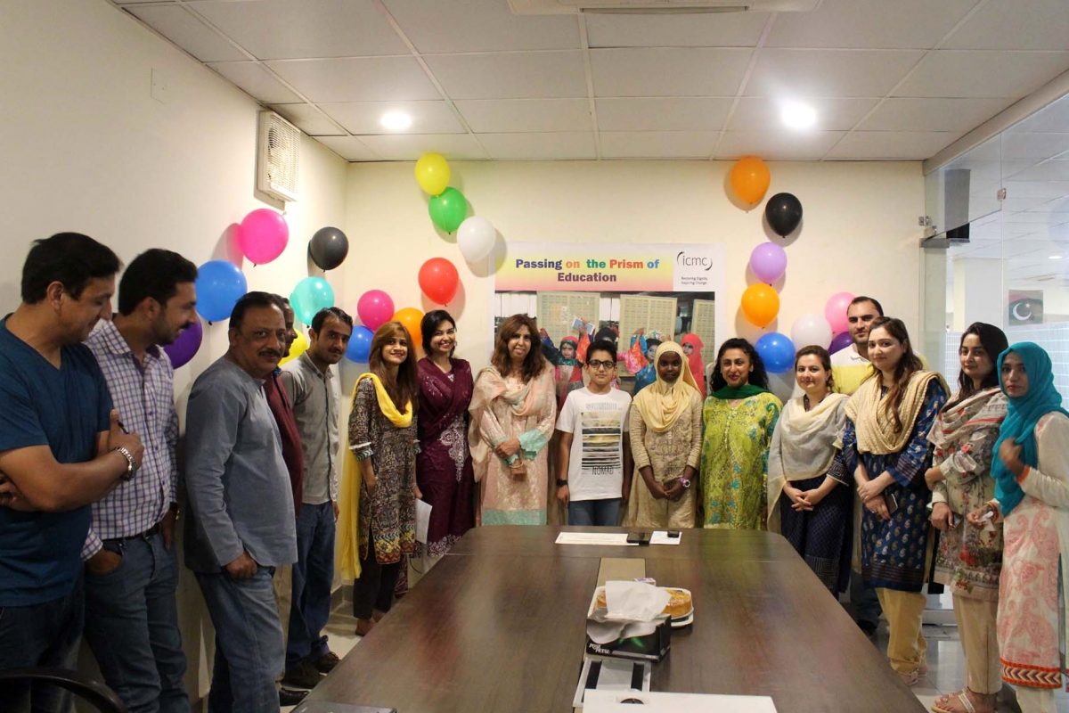 Pakistan’s staff celebrate Muhammad’s kind gesture of sponsoring a refugee’s studies.