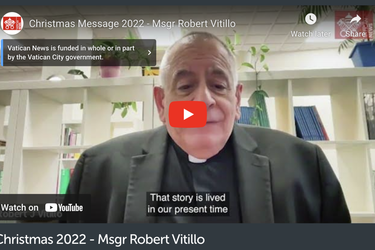 priest speaking to camera on Youtube