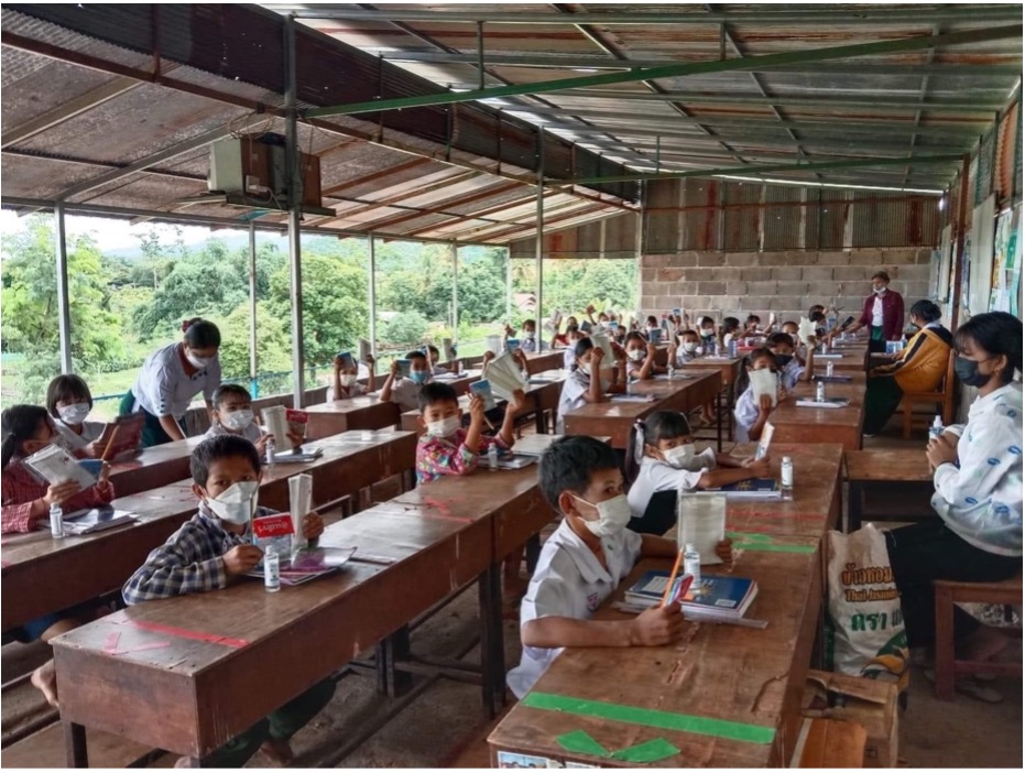 Migrant children from Myanmar participate in educational activities at a Sukothai learning center in Tak province, in northern Thailand