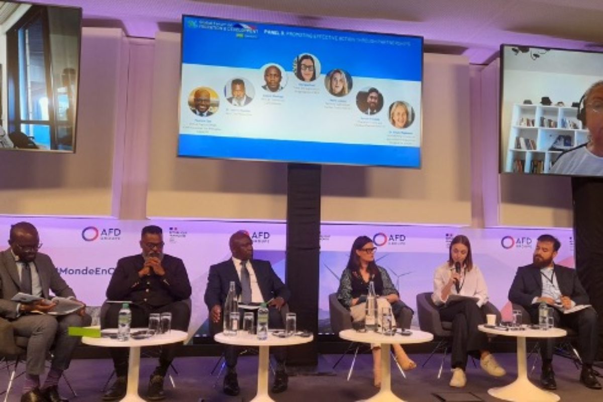 Panel speakers participate in a GFMD thematic discussion on climate change and mobility, held in Paris on June 28 2023