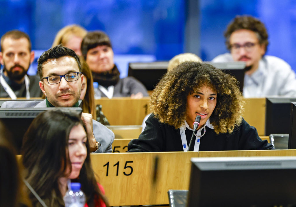 ICMC Europe’s Anna Coulibaly speaks at the 8th meeting of the European Migration Forum, held in Brussels in 4-5 December 2023 © ICMC Europe