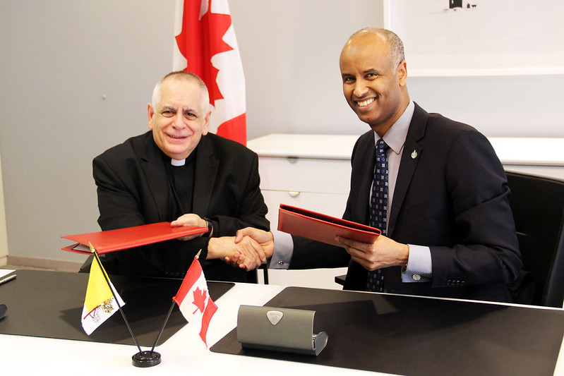 Msgr. Vitillo concludes an agreement with the Canadian government to support the ICMC Deployment Scheme, Geneva, 2017 © Barbara Sartore/ICMC