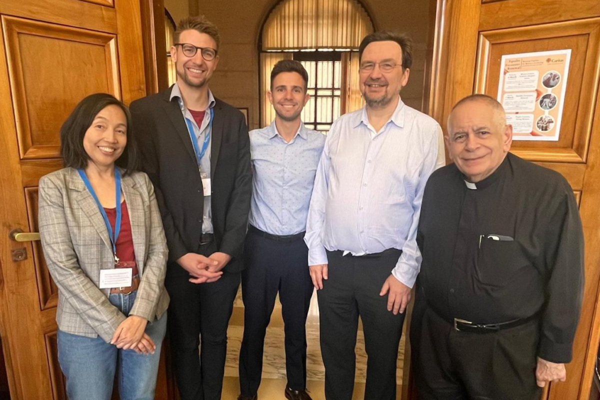 In May 2024, the Dicastery for Promoting Integral Human Development, ICMC, and the ILO convened the global ‘Care is Work, Work is Care’ consultation in Rome. Photo: Athena Peralta (left), Ignacio Alonso Alasino (center) and Pierre Martinot-Lagarde (second left), with participants at the ‘Care is Work, Work is Care’ consultation © Future of Worker after Laudato Si’ (FOWLS) Project